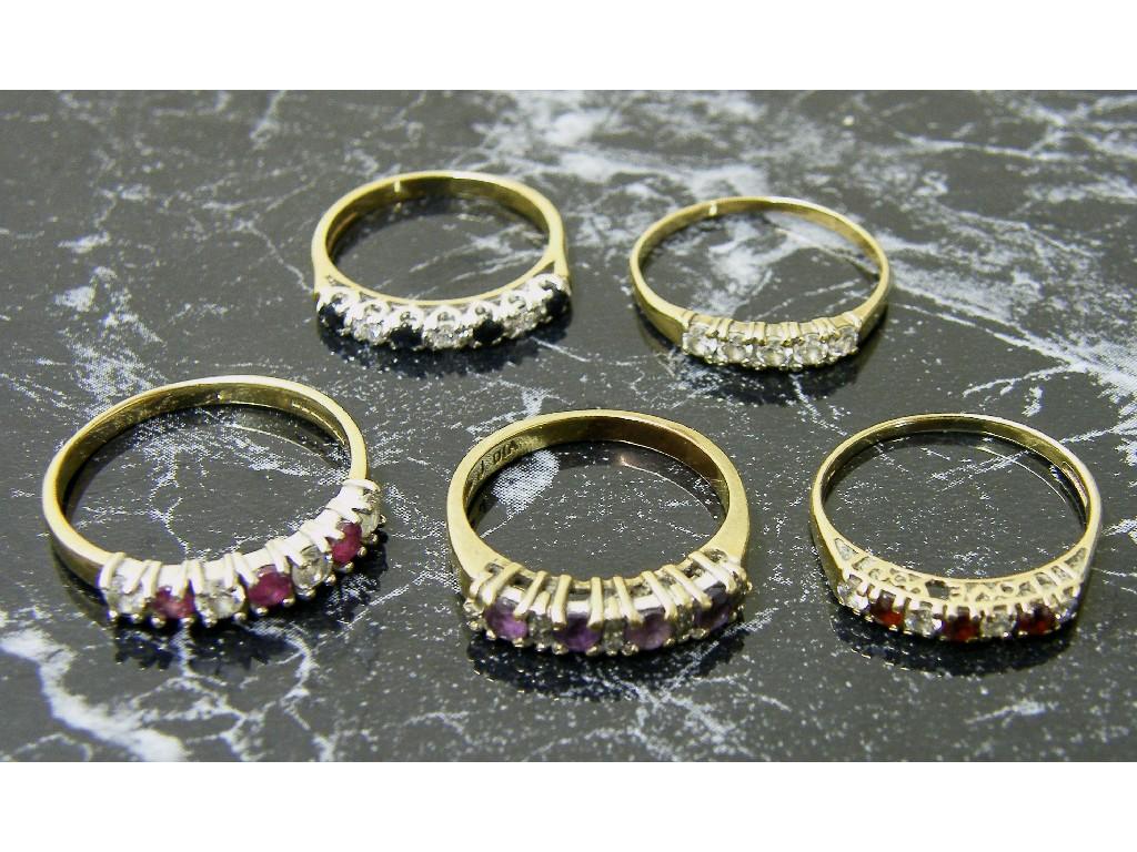 Appraisal: Five assorted ct stone set half eternity rings gm