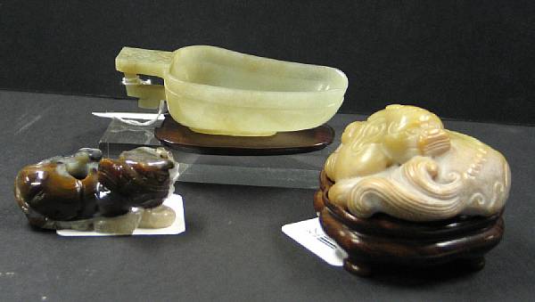 Appraisal: Three hardstone carvings The first a celadon hardstone miniature spouted