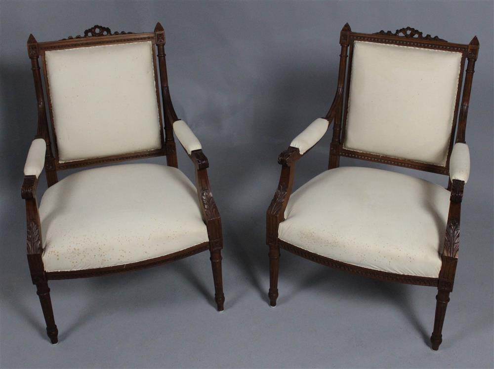 Appraisal: PAIR OF LOUIS XV STYLE BEECHWOOD FAUTEUILS upholstered in white