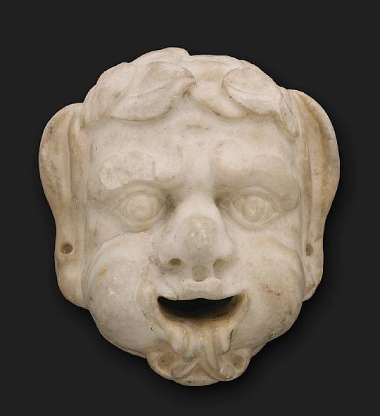 Appraisal: An Italian Baroque fountain mask of a putto th century