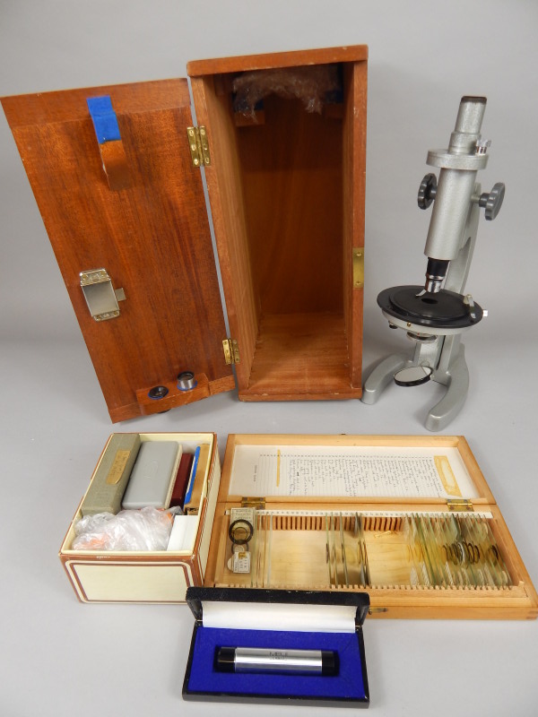 Appraisal: A steel microscope in mahogany fitted case various microscope slides