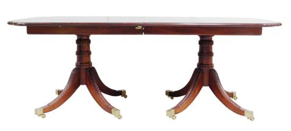 Appraisal: Centennial dining table oblong shape with incut corners double pedestal