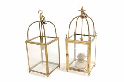 Appraisal: Two similar brass hall lanterns one with urn finials and