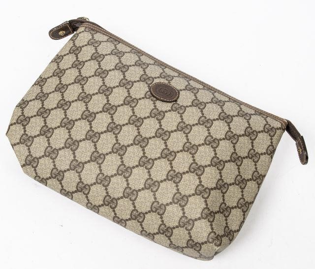 Appraisal: Gucci Accessory Collection pouch in Supreme monogram coated canvas having