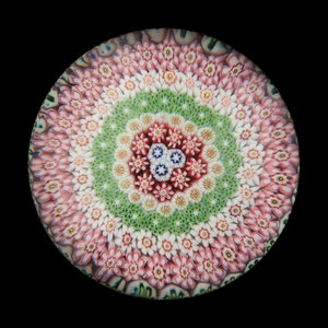 Appraisal: A Concentric Millefiori Glass Paperweight Attributed to Clichy over a