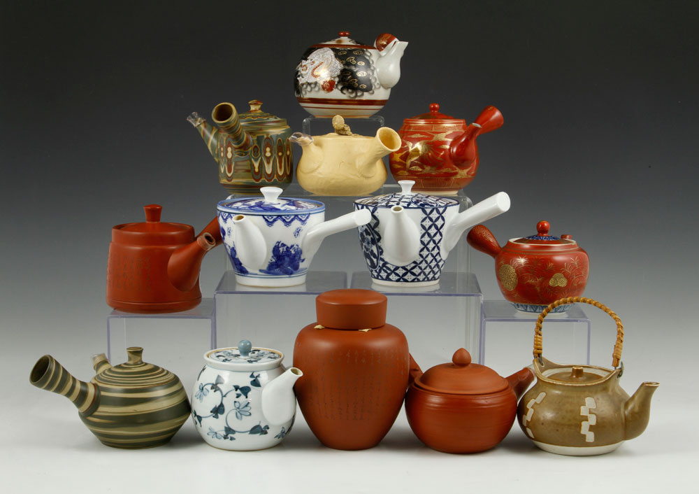 Appraisal: - Japanese Tea Items Lot of thirteen Japanese teapots and