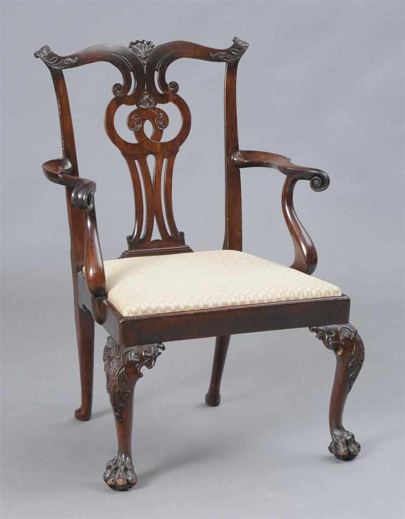 Appraisal: FINE GEORGE III CARVED MAHOGANY ARMCHAIR The serpentine top rail