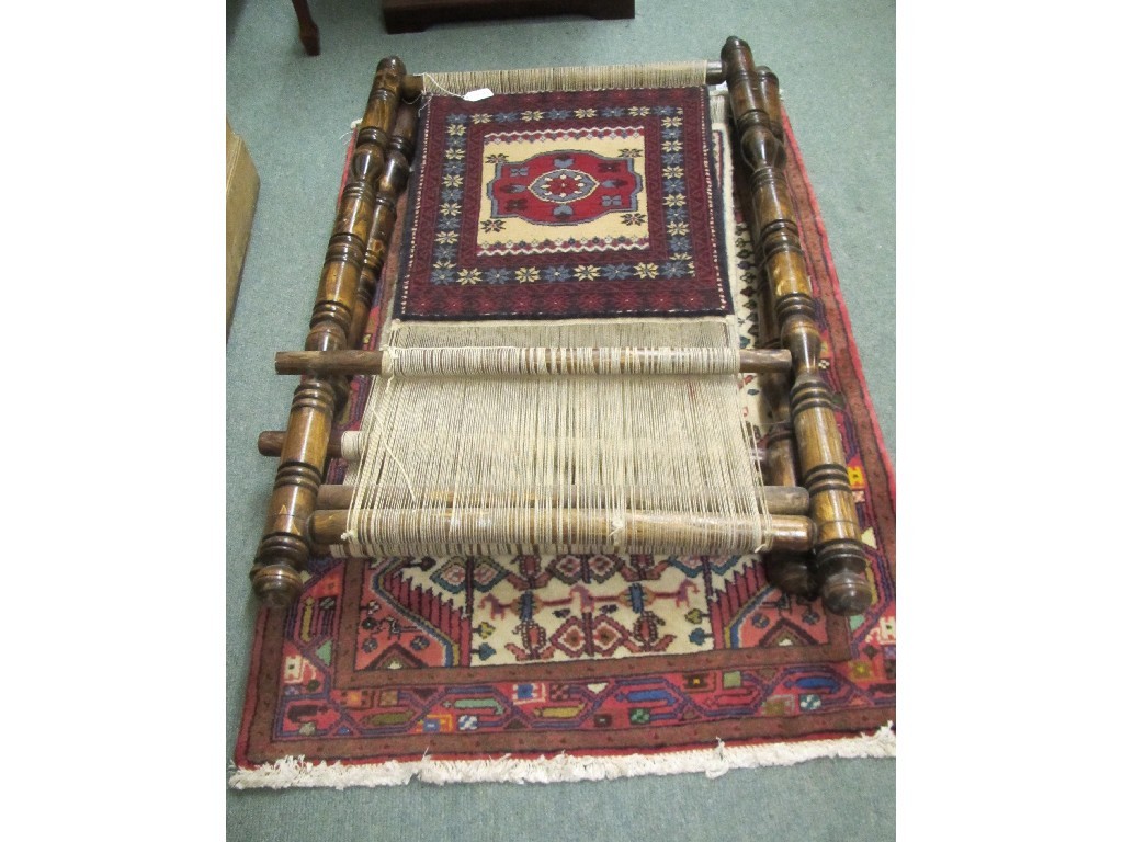 Appraisal: Iranian floor rug and two rug samples