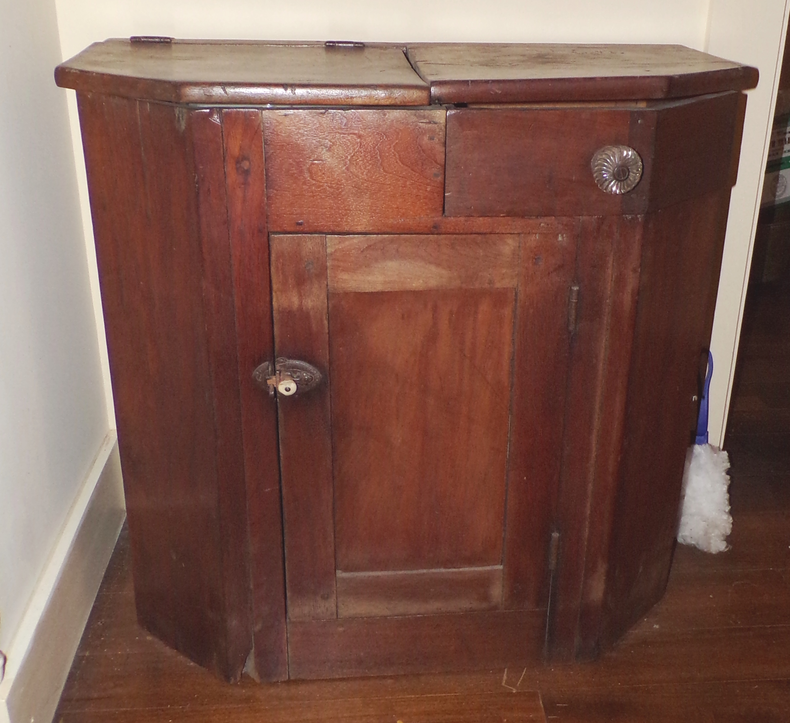 Appraisal: Primitive cupboard- drawer over a door flip-top for dry sink