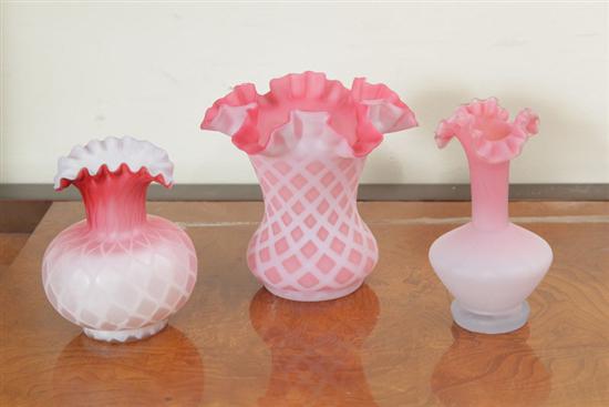 Appraisal: THREE PINK VICTORIAN SATIN GLASS VASES All with ruffled edges