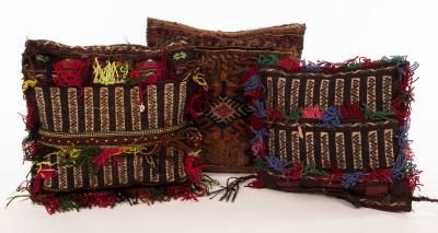 Appraisal: Three vintage Afghan saddlebag cushions with needlework decoration and fringed