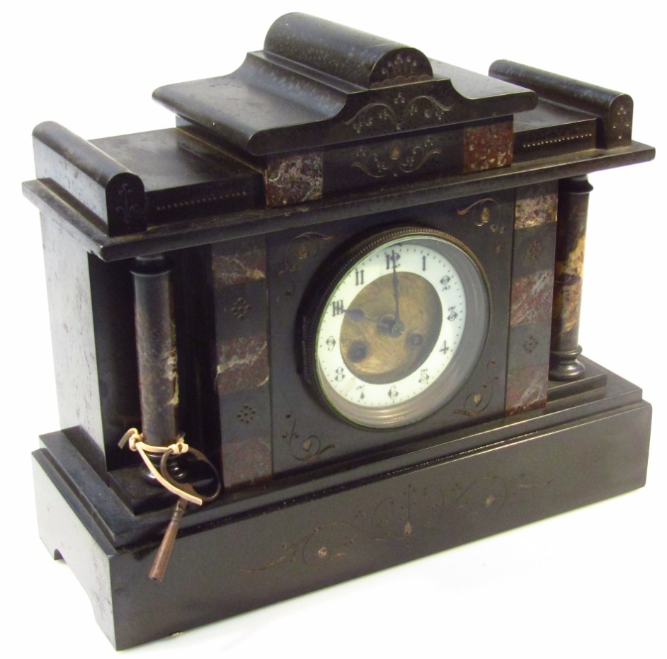 Appraisal: A Victorian black slate mantel clock of architectural design the