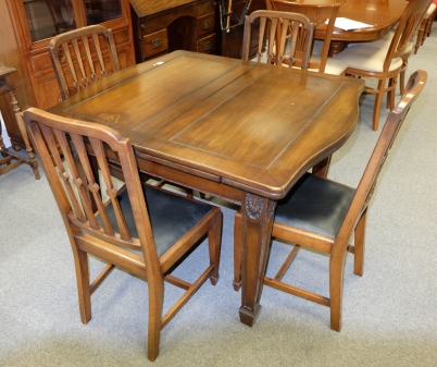 Appraisal: Edwardian walnut draw leaf table with tapered leg and matching