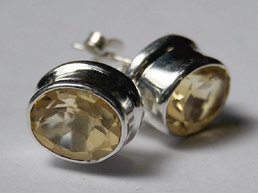 Appraisal: Pair of citrine stud earrings white metal set