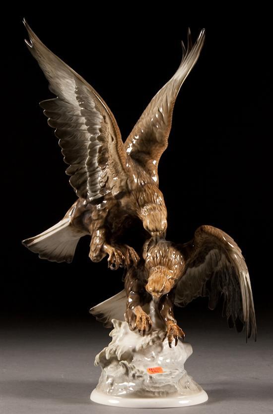 Appraisal: Hutschenreuther porcelain figural group of two golden eagles perched on