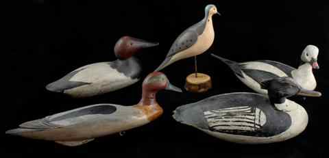 Appraisal: FOUR CARVED AND PAINTED DUCK ONE BIRD DECOYS including a