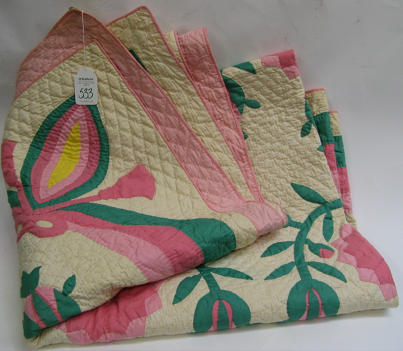 Appraisal: AMERICAN HAND PIECED AND APPLIQUED QUILT appliqued rose pink green