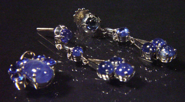 Appraisal: K white gold and sapphire pendant and matching earrings