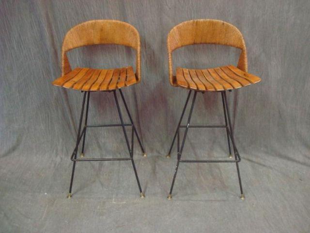 Appraisal: Pair of Arthur Umanoff Slatted Roped Swivel Stools Midcentury From