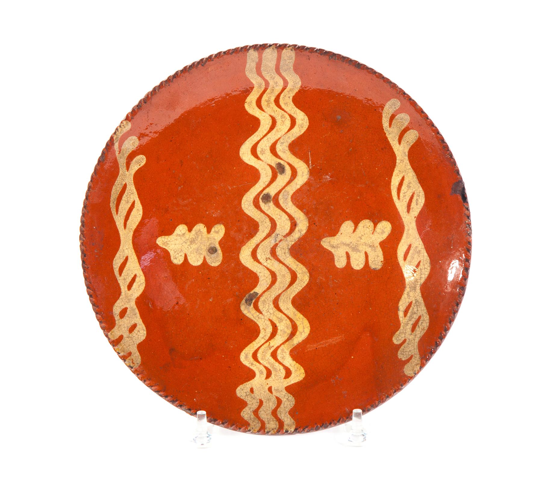 Appraisal: AMERICAN REDWARE PIE PLATE Mid th century Coggled rim and