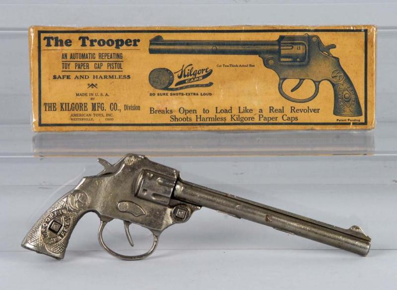 Appraisal: Cast Iron Kilgore Long Barrel Trooper Cap Gun Description Includes