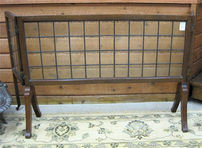 Appraisal: THREE-PANEL WALNUT AND LEADED GLASS FIRE SCREEN English Edwardian c