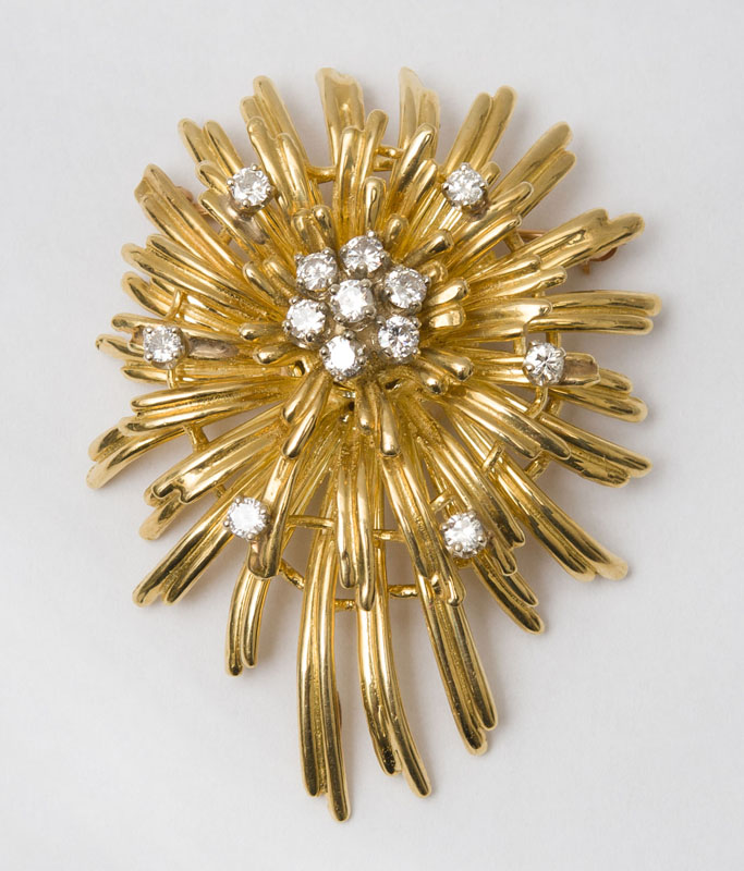 Appraisal: K GOLD AND DIAMOND BROOCH Set with full cut diamonds