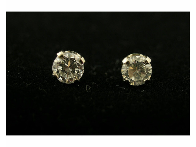 Appraisal: Pair of ct diamond stud earrings containing two round brilliant