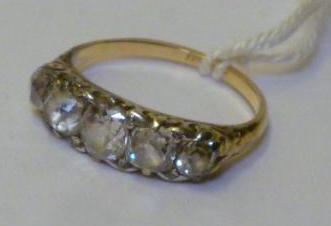 Appraisal: A FIVE STONE DIAMOND RING the old cushion cut graduated