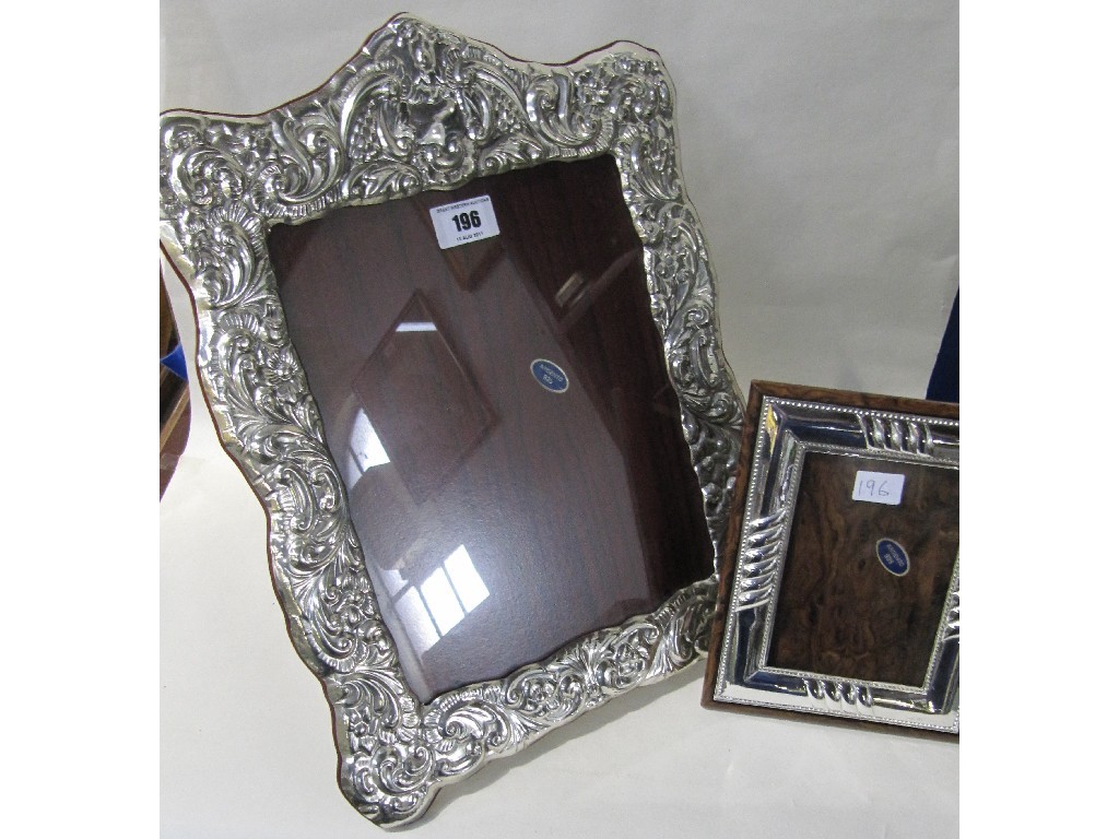 Appraisal: Lot comprising two modern silver mounted photo frames