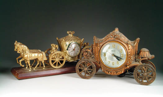 Appraisal: TWO ELECTRIC FIGURAL COACH CLOCKS - h x l with