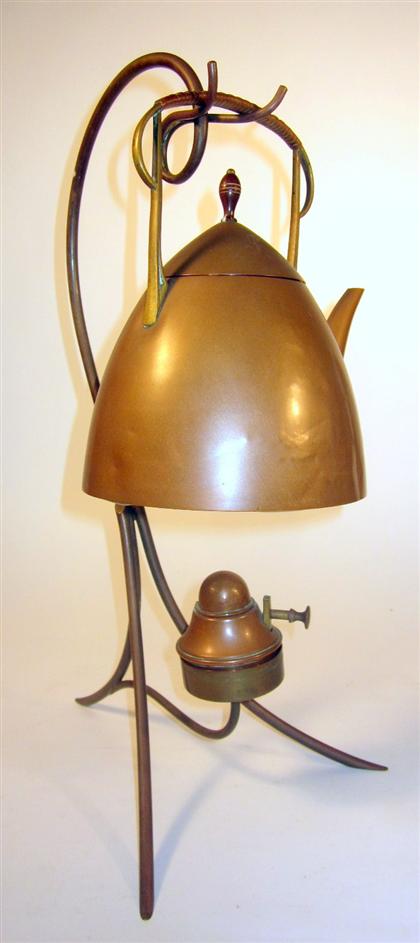 Appraisal: Art Nouveau copper hanging tea kettleThe conical tea kettle supported