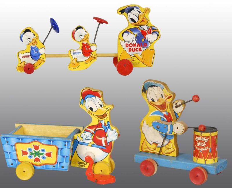 Appraisal: Lot of Fisher Price Donald Duck Pull Toys Description American