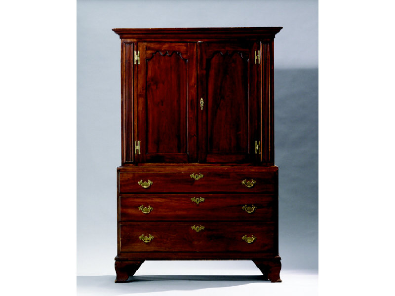 Appraisal: AMERICAN TH CENTURY MAHOGANY PRESS CUPBOARD Overhanging cornice above the