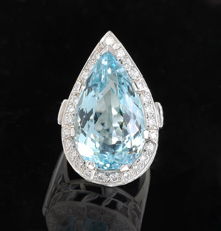 Appraisal: CT PEAR CUT AQUAMARINE IN PLATINUM RING Sparkling CT center