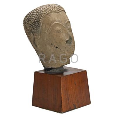 Appraisal: THAI STONE BUDDHA HEAD On wood pedestal th c Tip