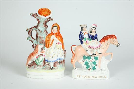 Appraisal: TWO STAFFORDSHIRE FIGURES Returning Home a man and woman on