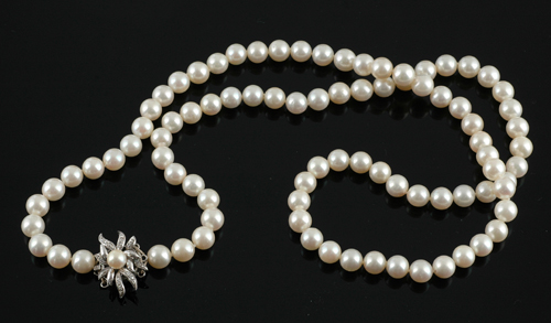 Appraisal: An opera length strand of cultured pearls The eighty seven