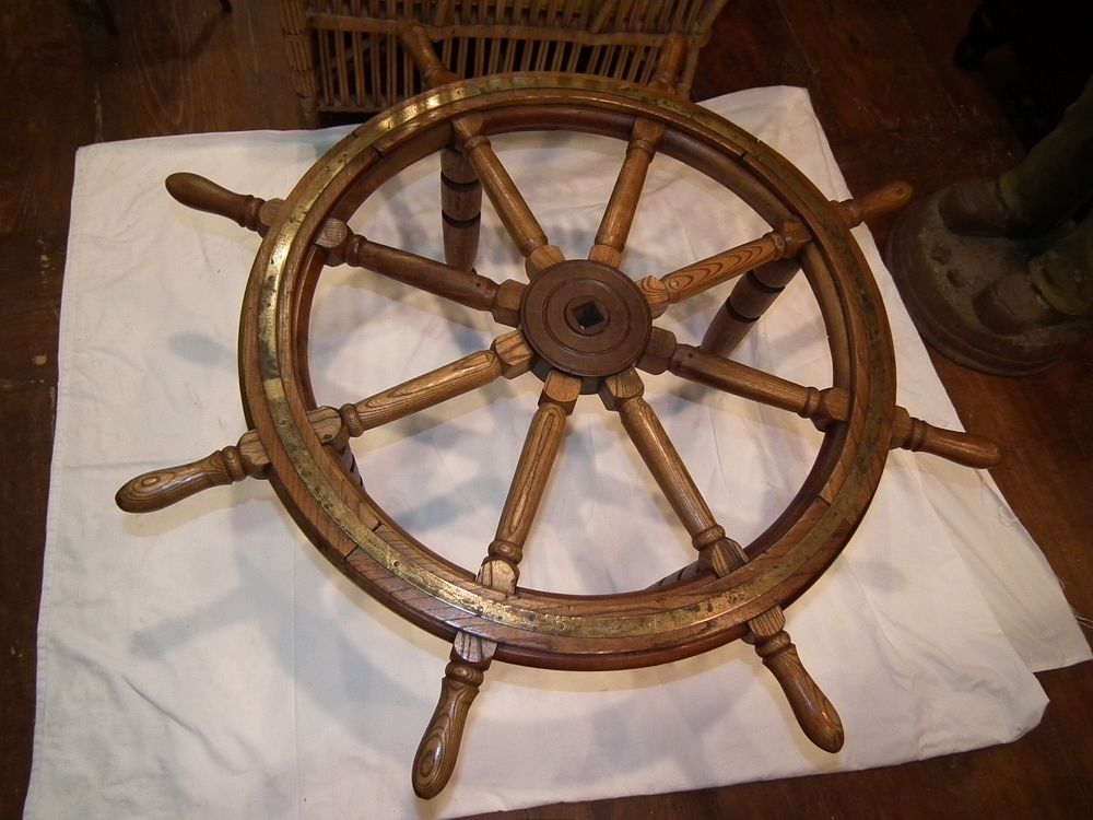 Appraisal: SHIPS WHEEL COFFEE TABLE Old ship's wheel coffee table no