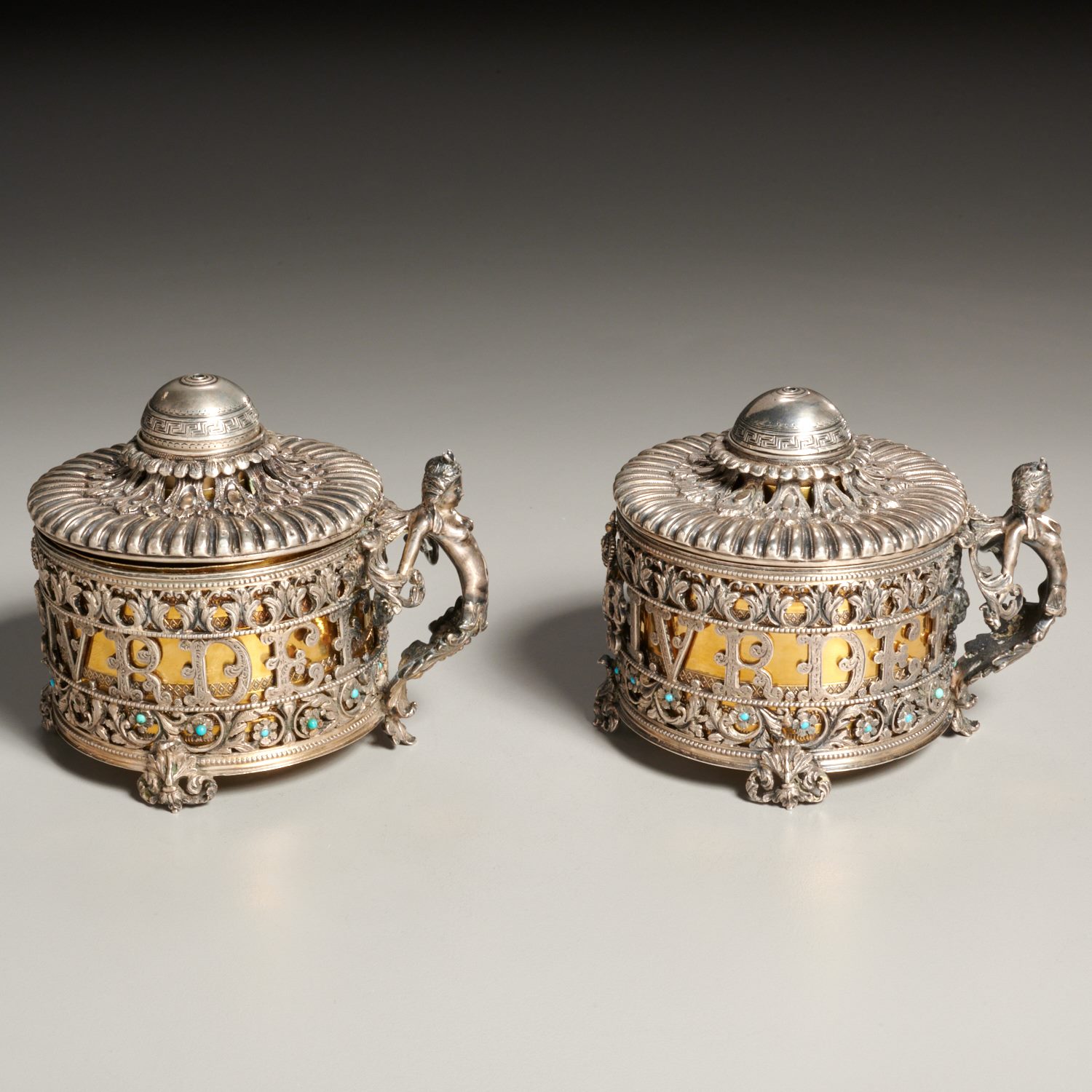 Appraisal: UNUSUAL PAIR CONTINENTAL SILVER CONDIMENT SERVERS th c possibly Russian