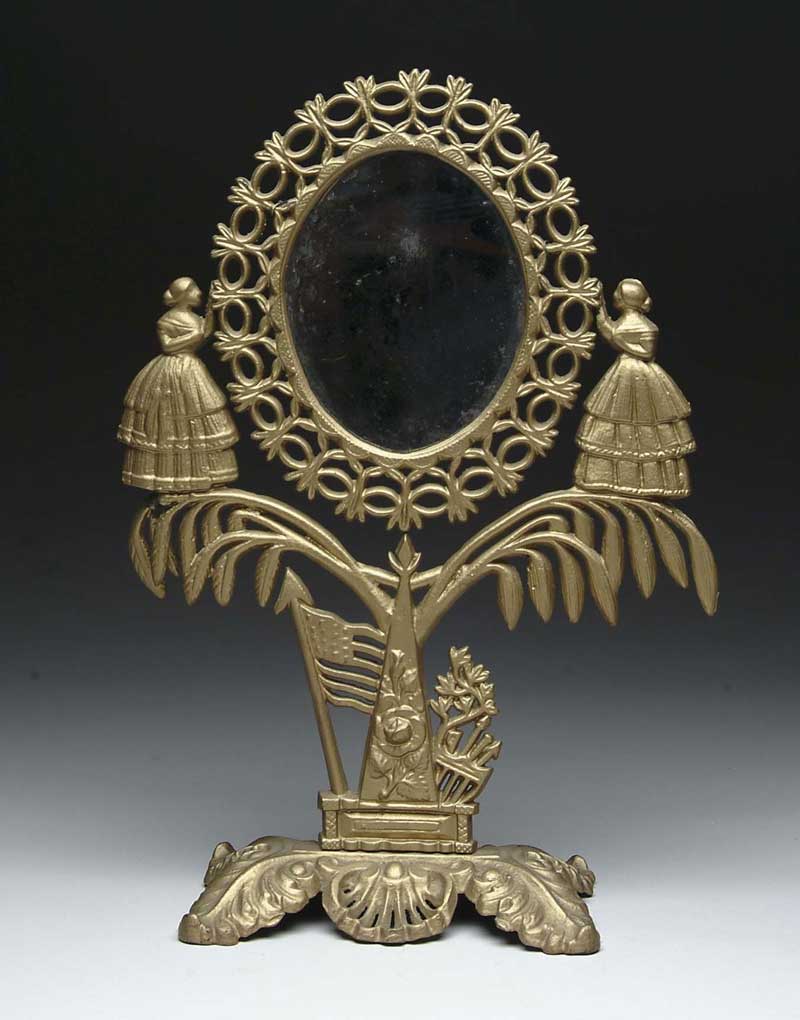 Appraisal: ANTIQUE CAST METAL JENNY LIND VANITY MIRROR This ornate th