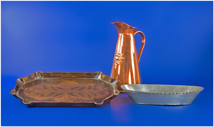 Appraisal: Arts and Crafts Copper Jug with an Embossed Flower Hammered