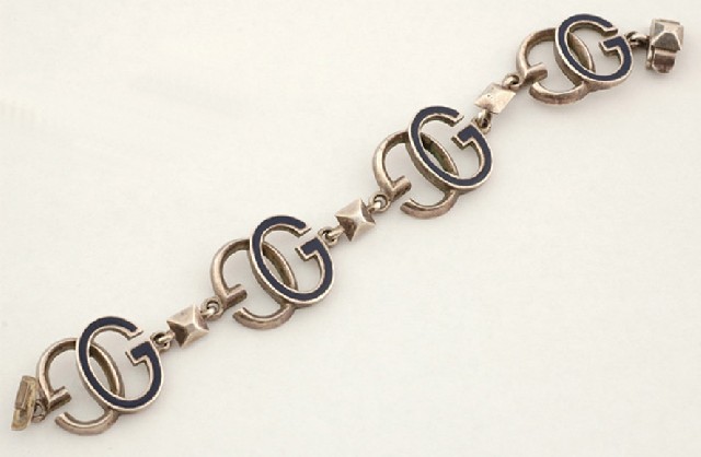 Appraisal: A sterling silver and enamel bracelet by Gucci Comprising large