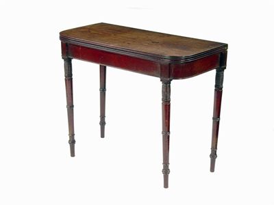 Appraisal: A Regency mahogany card table the reeded edge hinge top