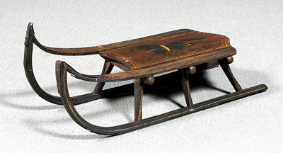 Appraisal: Painted wood and iron sled original paint on top with