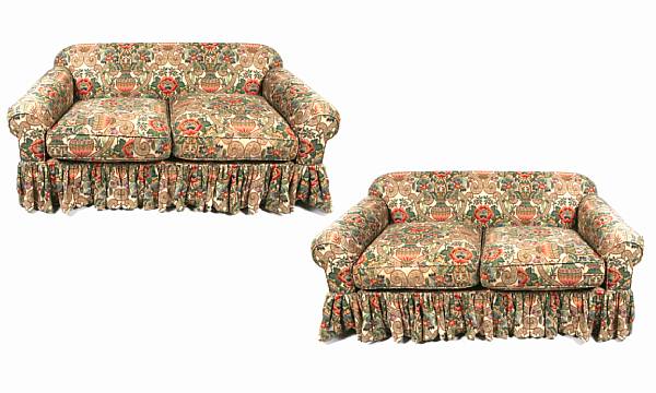 Appraisal: A pair of fully upholstered sofas in the William Morris