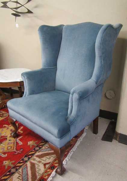 Appraisal: CHIPPENDALE STYLE WINGBACK ARMCHAIR American mid- th century with blue