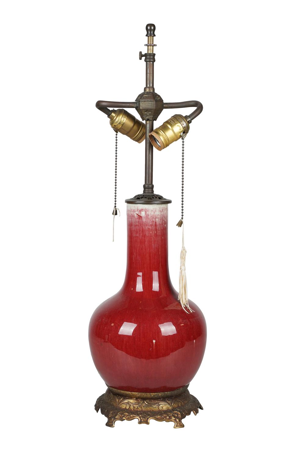 Appraisal: CHINESE OXBLOOD VASEmounted and electrified as a table lamp the