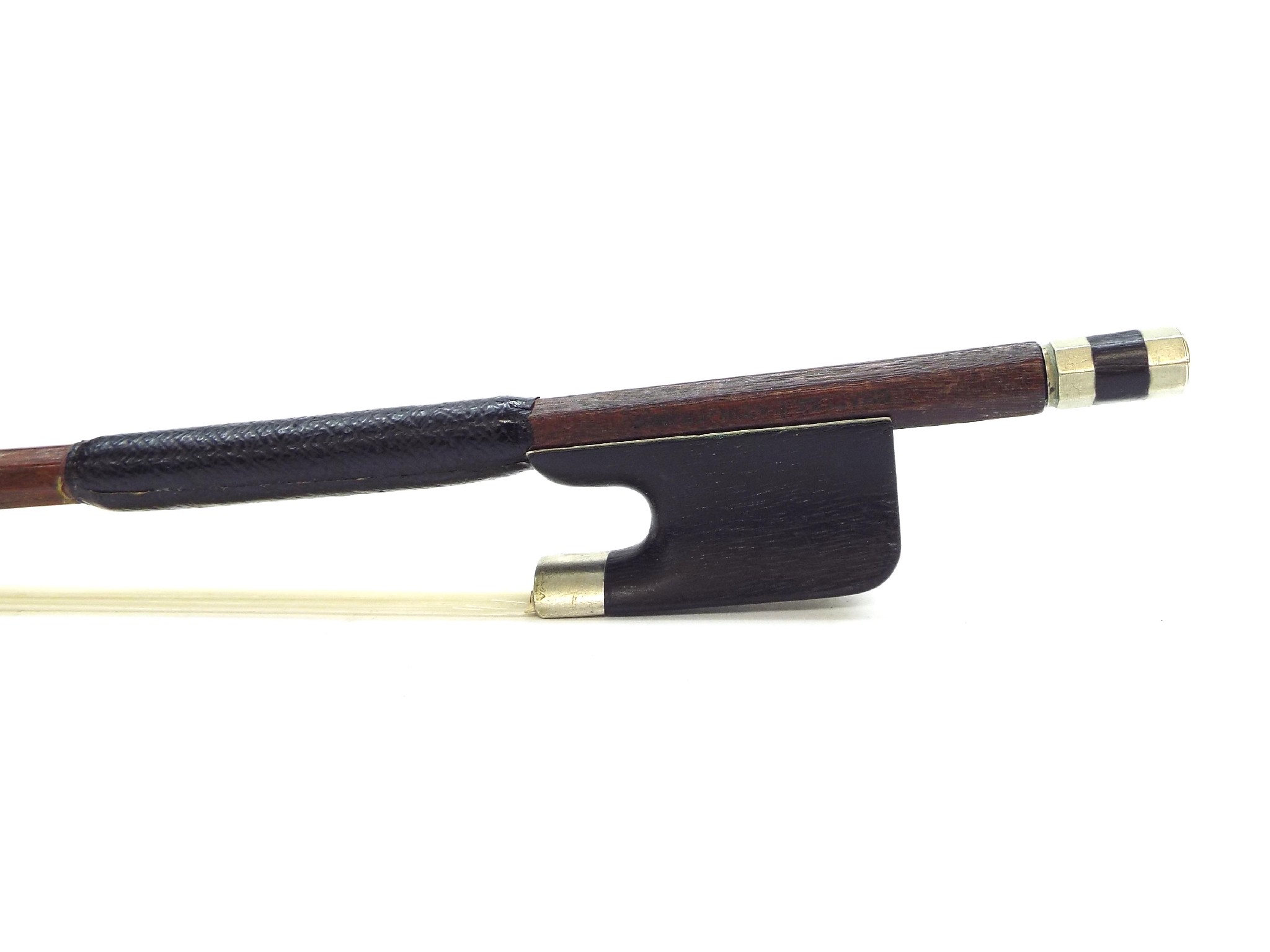 Appraisal: Nickel mounted violin bow stamped Charles Bazin-France the stick round