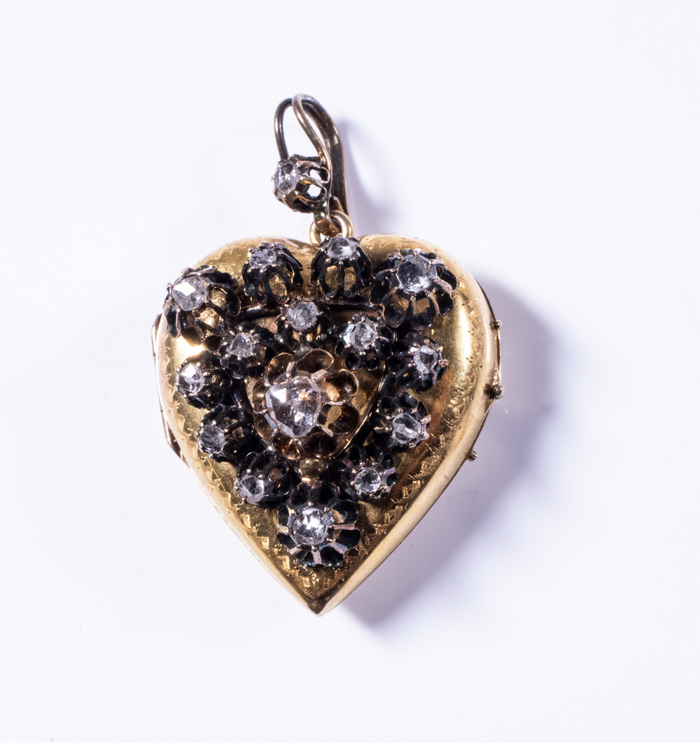 Appraisal: GOLD DIAMOND HEART PENDANT th c Diamond Studded K Yellow